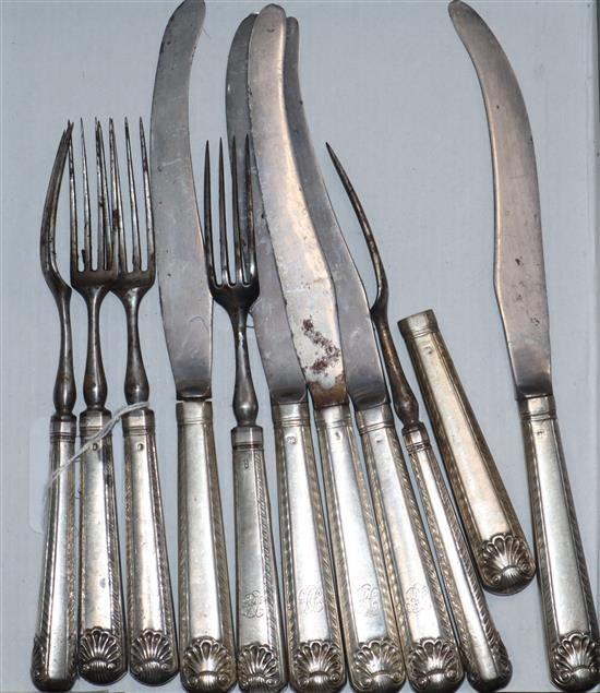 A part set of silver handled knives and forks, c.1800, engraved with RT monogram.